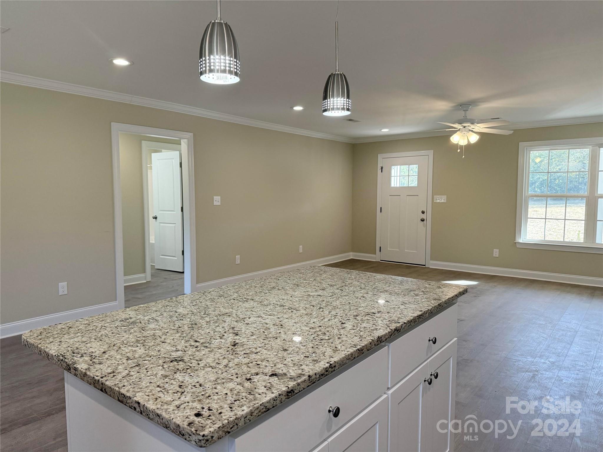 2438-j B J B Denton Road Lancaster, SC 29720 - Photo 8 of 23 a view of a kitchen cabinets and chandelier