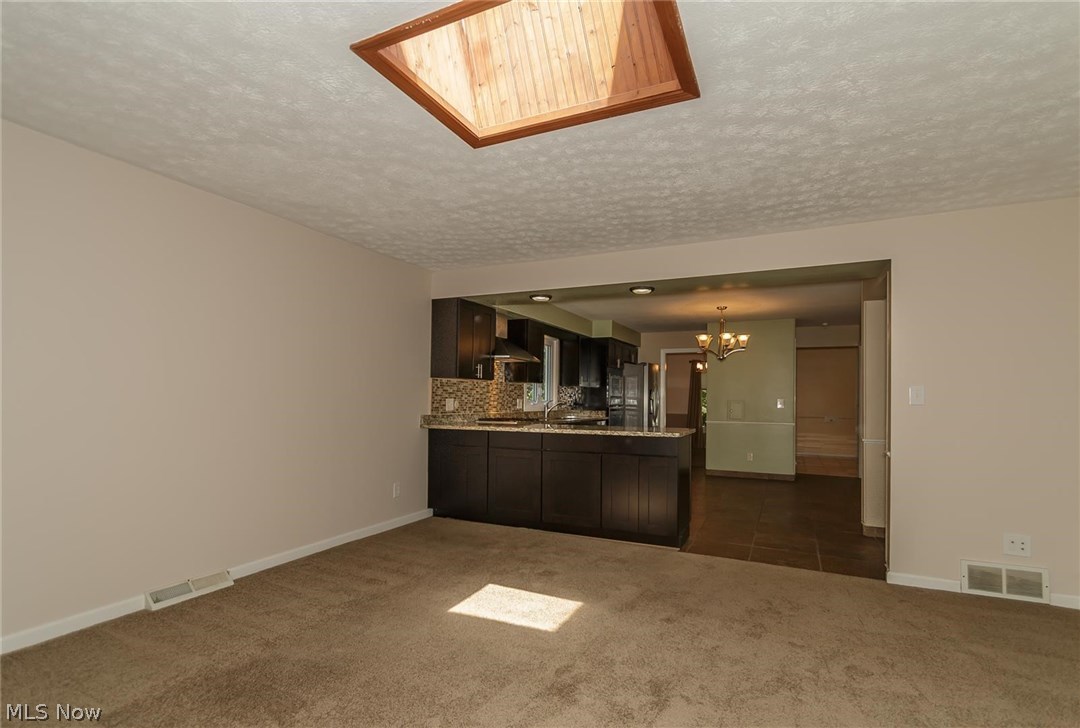 5590 Ridgebury Boulevard Lyndhurst, OH 44124 - Photo 19 of 25 Gathering room, with plenty of sun or moon.
