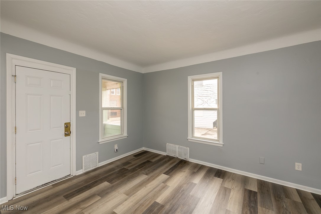 15328 Shiloh Road Cleveland, OH 44110 - Photo 10 of 27 Entrance foyer featuring wood finished floors and healthy amount of natural light