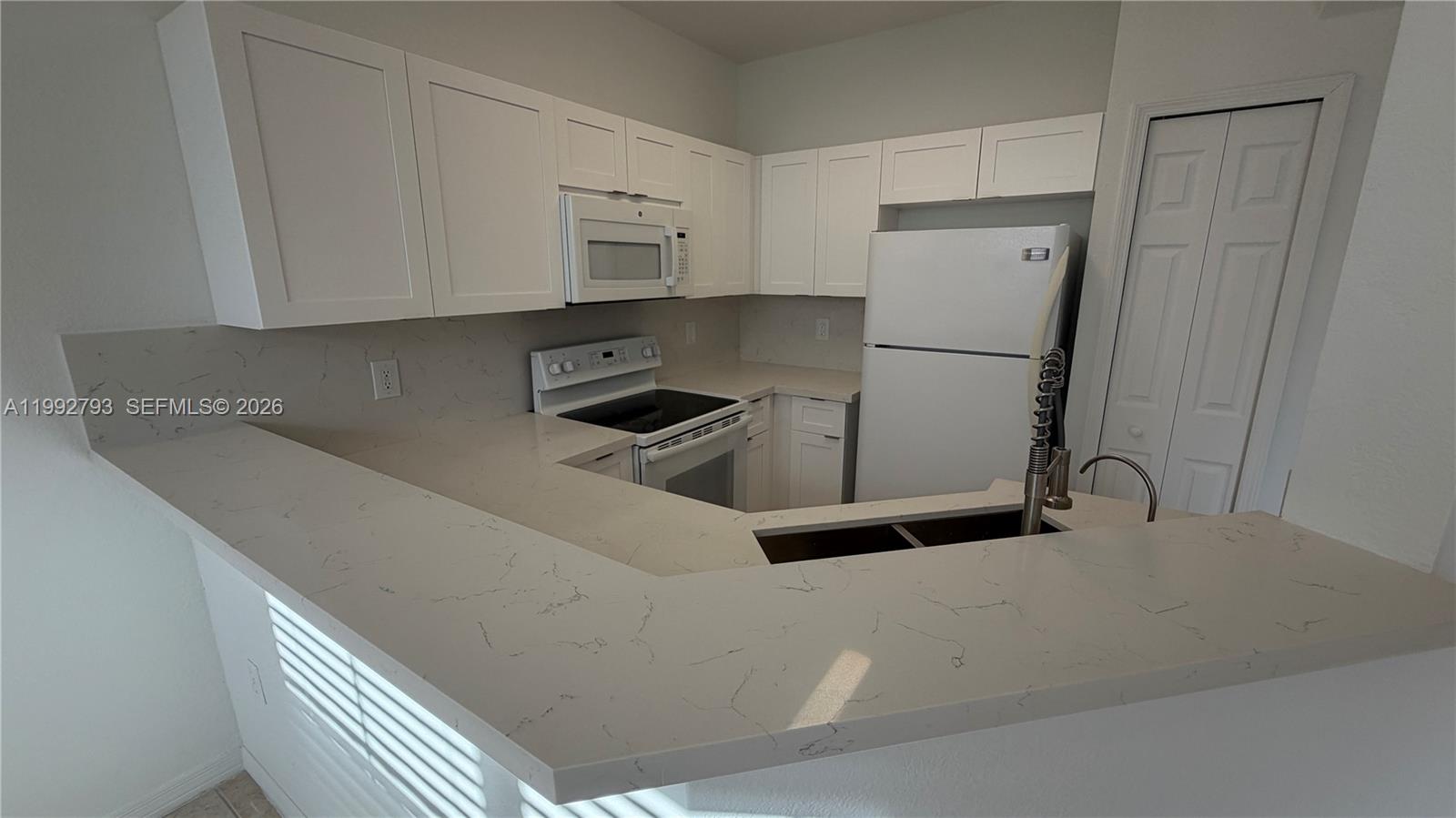 12260 Southwest 123rd Pass Miami, FL 33186 - Photo 4 of 14 a room with storage and utility