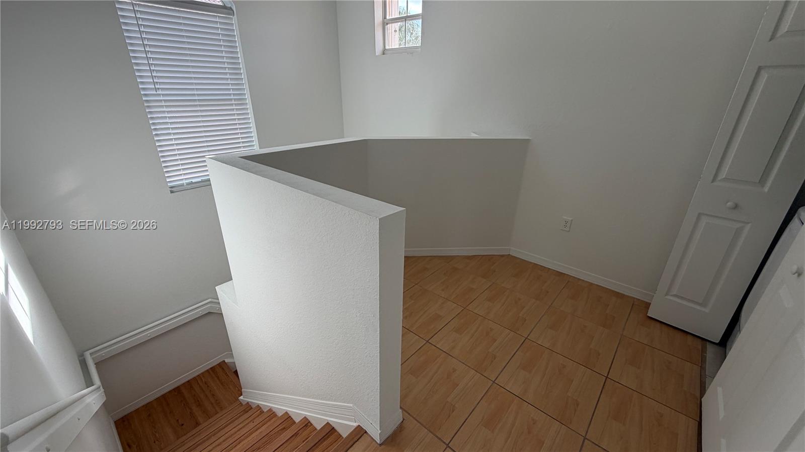 12260 Southwest 123rd Pass Miami, FL 33186 - Photo 8 of 14 an empty room with windows