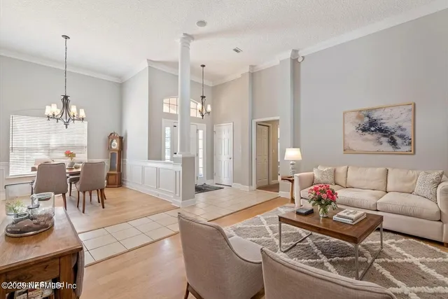 a bathroom with a toilet a sink and glass door