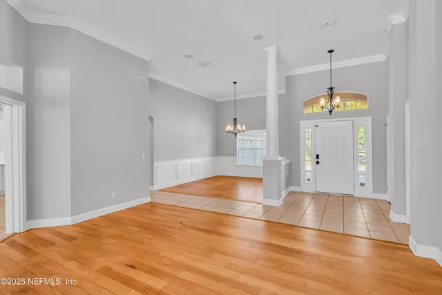 a bathroom with a shower a toilet and a tub