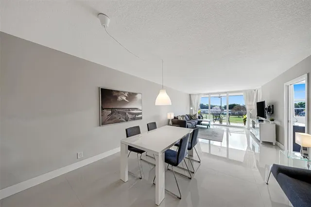 $299,000 | 4030 West Palm Aire Drive, Unit 406, Pompano Beach, FL 33069