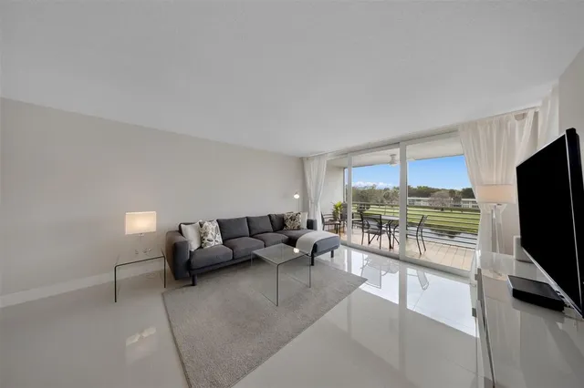 $299,000 | 4030 West Palm Aire Drive, Unit 406, Pompano Beach, FL 33069