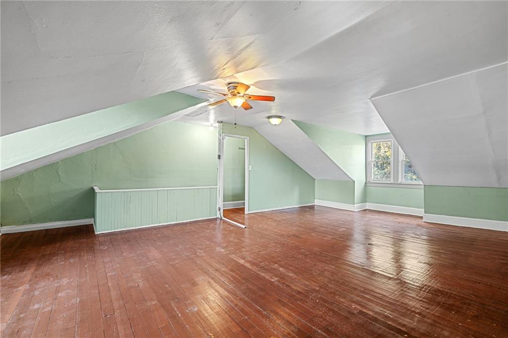 124 Silver Street Pittsburgh, PA 15209 - Photo 23 of 28 wooden floor in an empty room with a window