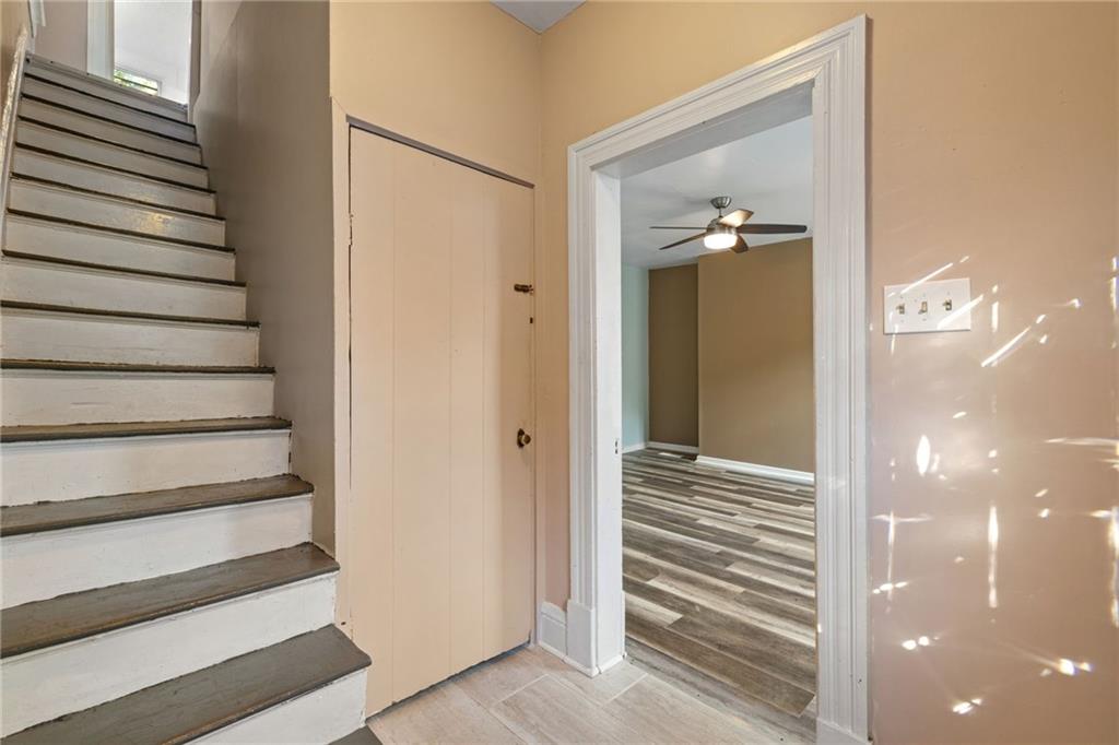 124 Silver Street Pittsburgh, PA 15209 - Photo 3 of 28 a view of a hallway with wooden floor and entryway