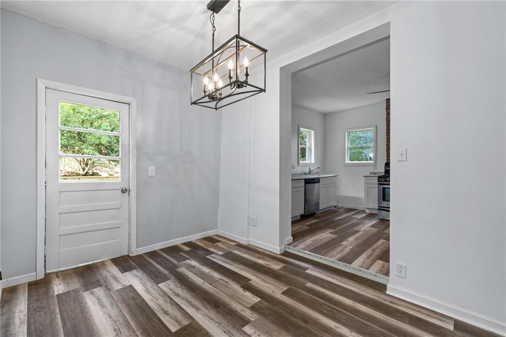 124 Silver Street Pittsburgh, PA 15209 - Photo 10 of 28 a view of a room window and wooden floor
