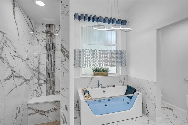 a bathroom with a sink and a bathtub