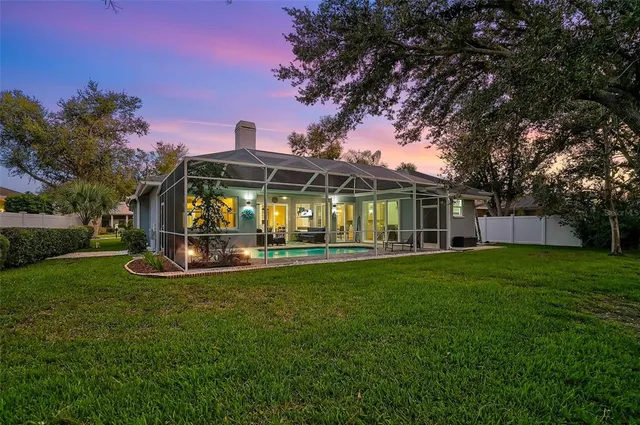 a view of a house with a big yard