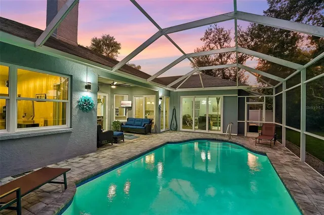 a view of a house with a swimming pool