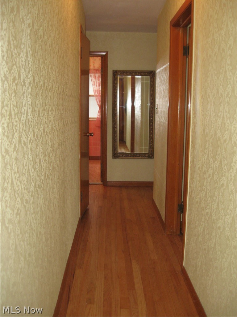 6154 State Road Parma, OH 44134 - Photo 16 of 35 Hall facing toward bathroom. A deep, linen closet is on left side right before bath.