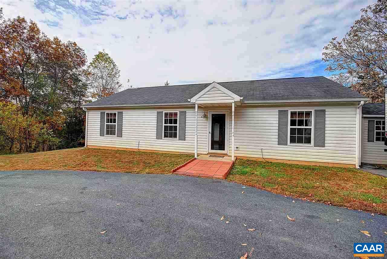 716 Jonquil Road Ruckersville, VA 22968 - Photo 1 of 21 a backyard of a house with wooden fence