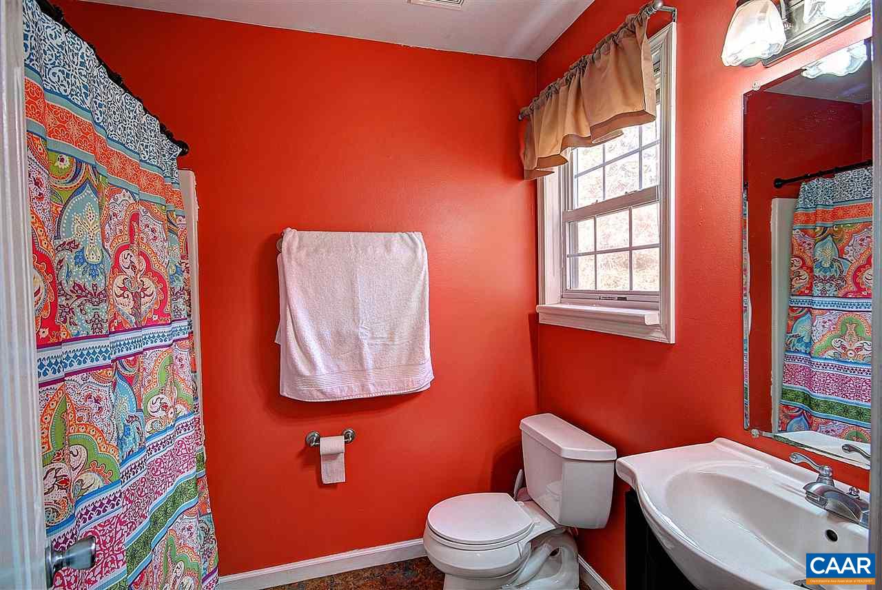716 Jonquil Road Ruckersville, VA 22968 - Photo 12 of 21 a bathroom with a toilet and a sink