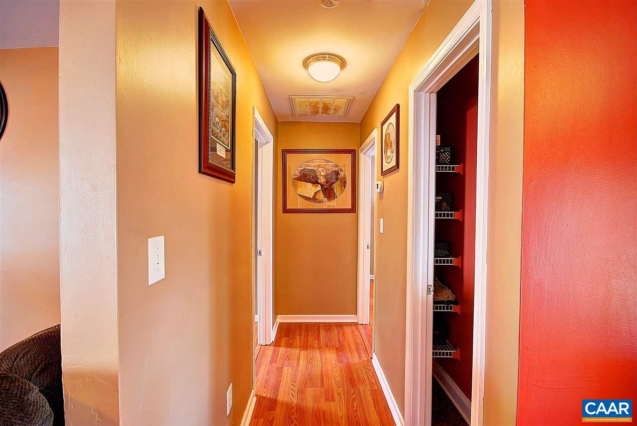 716 Jonquil Road Ruckersville, VA 22968 - Photo 13 of 21 a view of a hallway with wooden floor