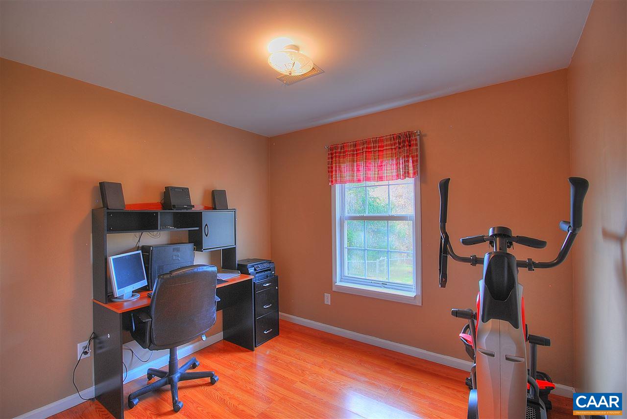 716 Jonquil Road Ruckersville, VA 22968 - Photo 15 of 21 a room with furniture and a window