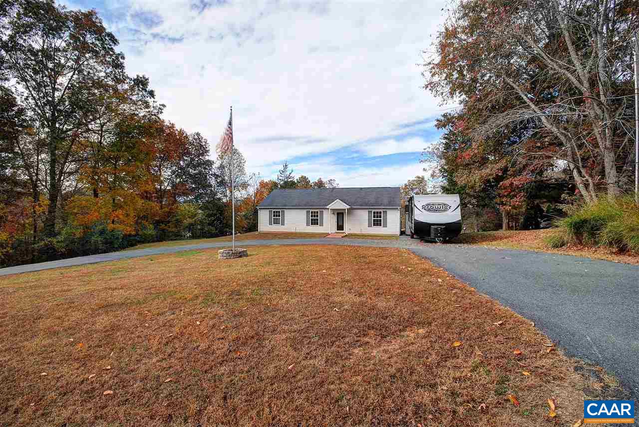 716 Jonquil Road Ruckersville, VA 22968 - Photo 21 of 21 a house with trees in front of it