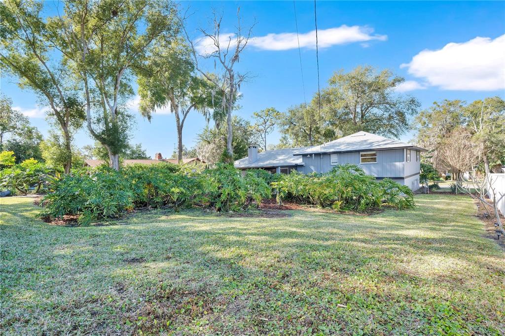 557 Karen Avenue Altamonte Springs, FL 32701 - Photo 26 of 35 a front view of a house with a yard