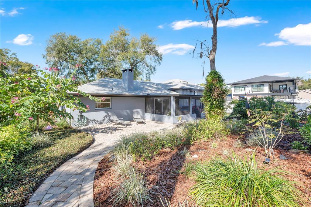557 Karen Avenue Altamonte Springs, FL 32701 - Photo 28 of 35 a front view of a house with garden