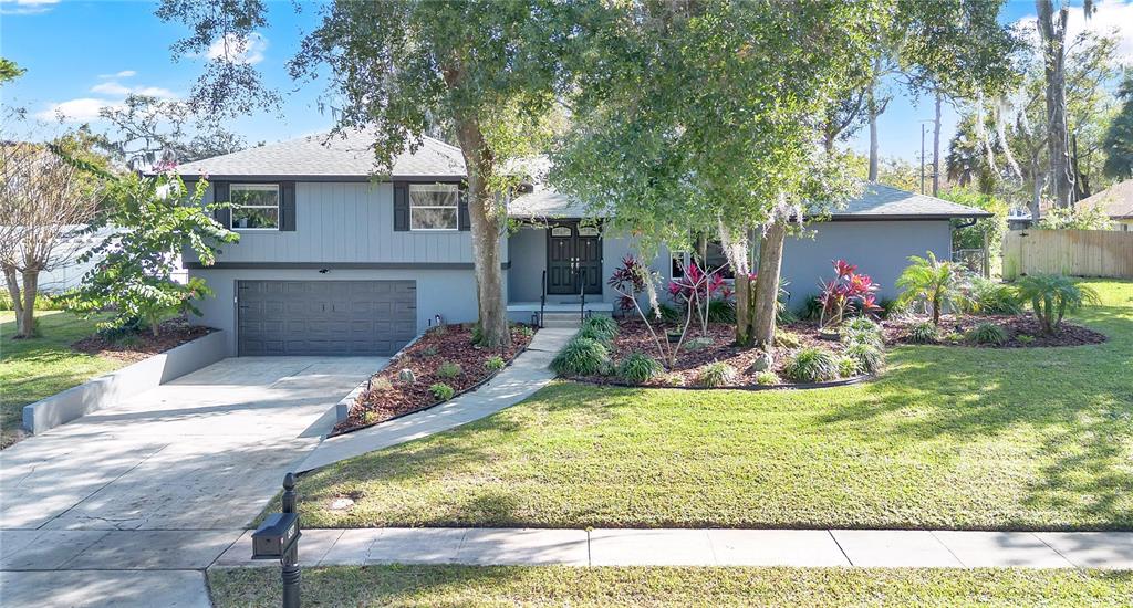 557 Karen Avenue Altamonte Springs, FL 32701 - Photo 31 of 35 a view of a house with pool and sitting area