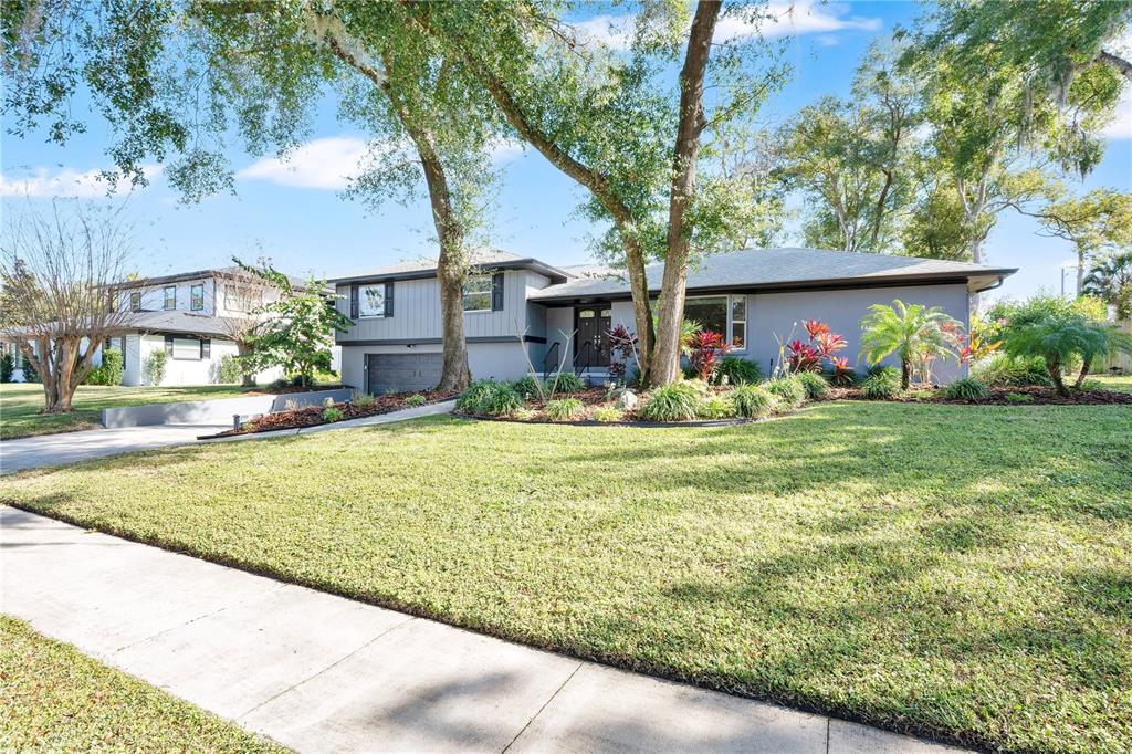 557 Karen Avenue Altamonte Springs, FL 32701 - Photo 4 of 35 a front view of house with yard