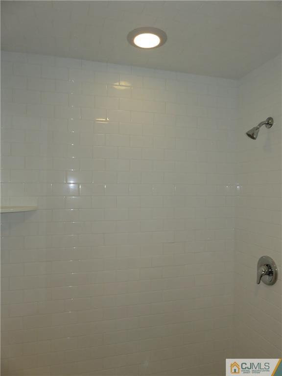 58 Harmon Road Edison, NJ 08837 - Photo 12 of 20 a bathroom with a shower