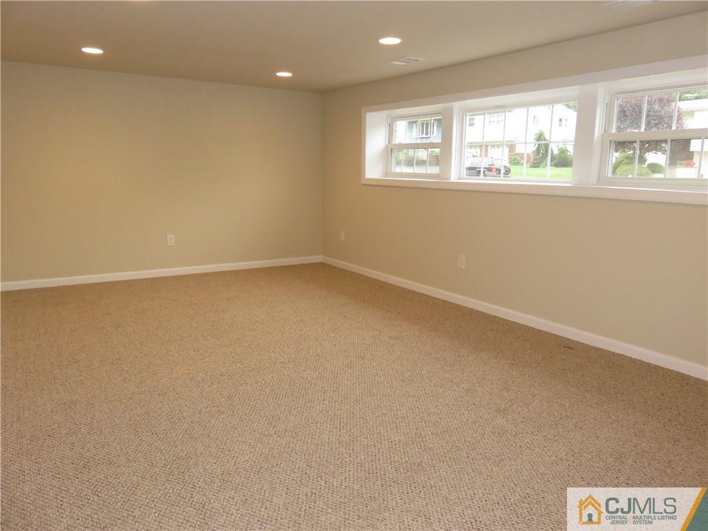 58 Harmon Road Edison, NJ 08837 - Photo 17 of 20 an empty room with windows