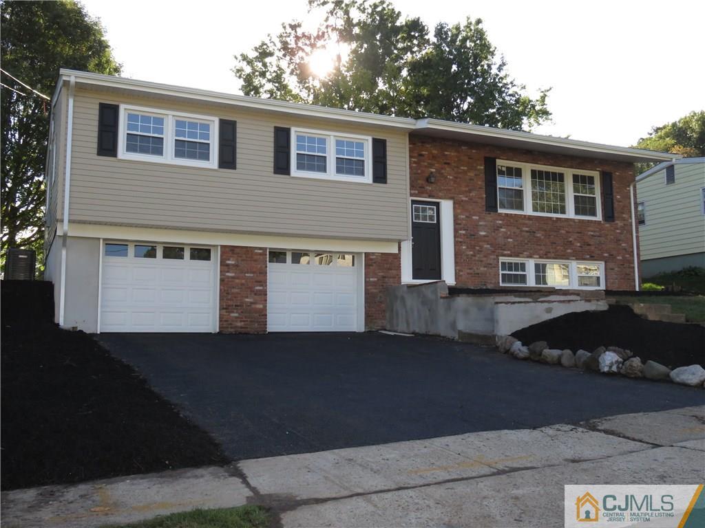 58 Harmon Road Edison, NJ 08837 - Photo 3 of 20 a front view of a house with a yard