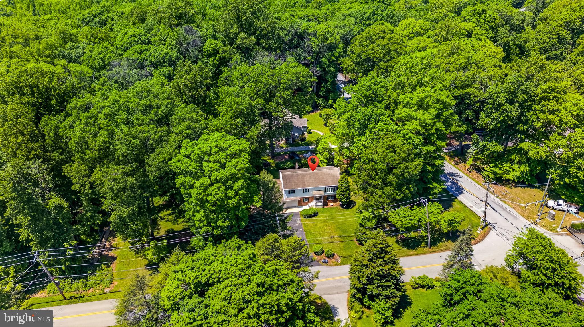 3701 Ebright Road Chadds Ford, PA 19317 - Photo 45 of 45 an aerial view of residential house with outdoor space and trees all around