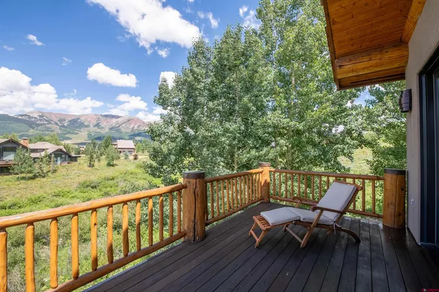 a view of a two chair in the balcony