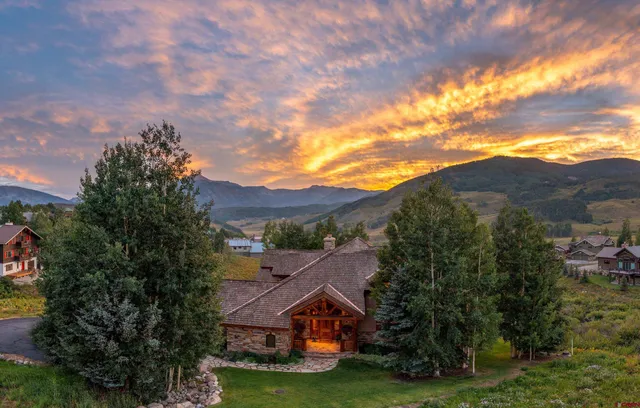 a view of house with garden space and street view