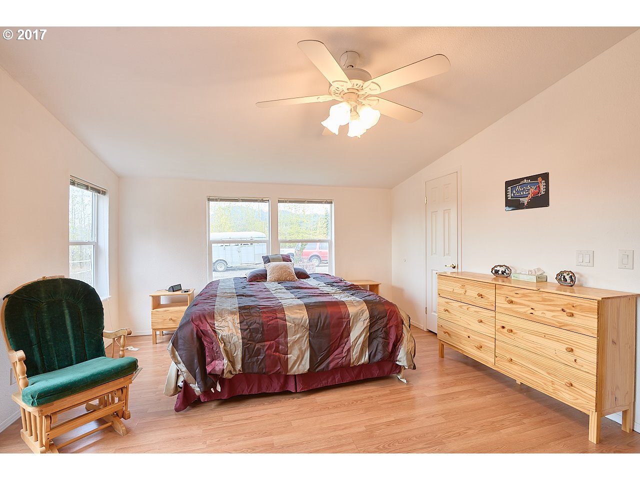 47765 Southwest Hebo Road Grand Ronde, OR 97347 - Photo 13 of 31 a spacious bedroom with a bed and window