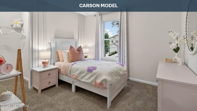 a bedroom with a bed and a sink