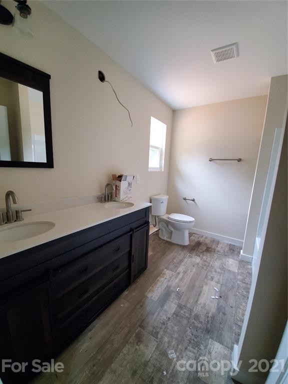 446 Porter Road Rock Hill, SC 29730 - Photo 12 of 15 a bathroom with a double vanity sink and a mirror