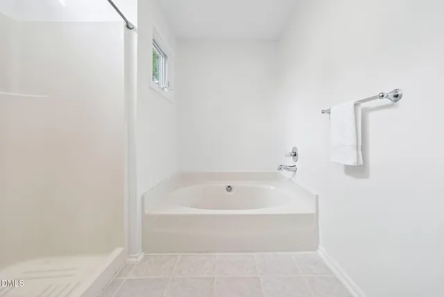 a bathroom with a sink toilet and a mirror