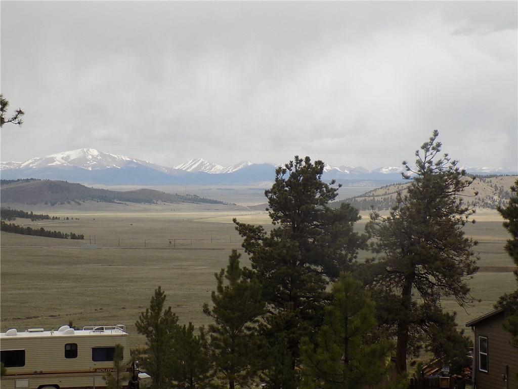 3722 Campfire Road Hartsel, CO 80449 - Photo 2 of 15 a view of a lake and mountain view