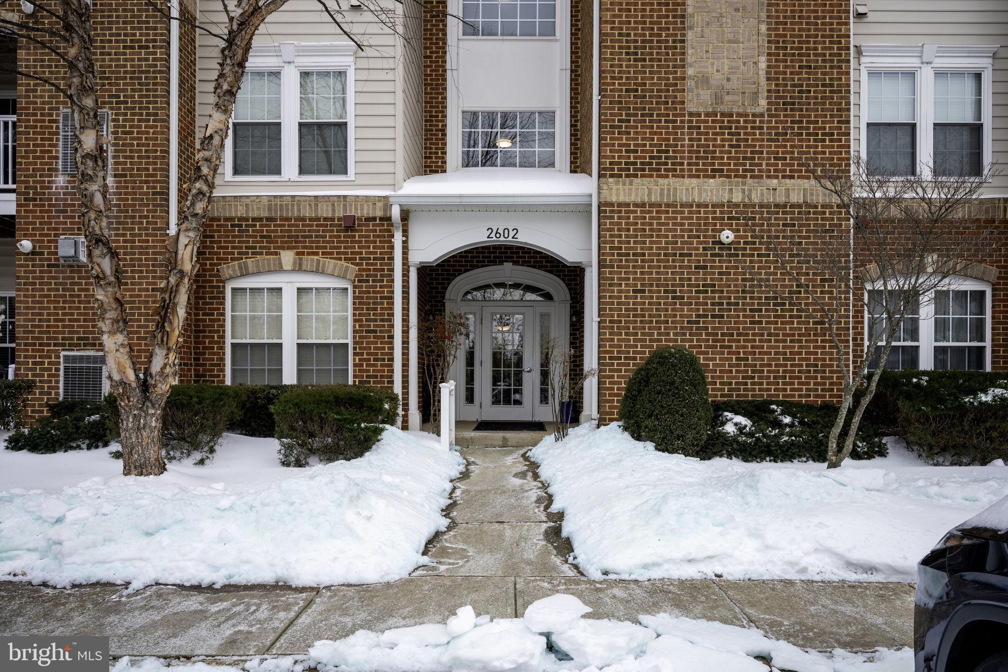 2602 Clarion Court, Unit 404 Odenton, MD 21113 - Photo 38 of 38 a view of a house with a yard