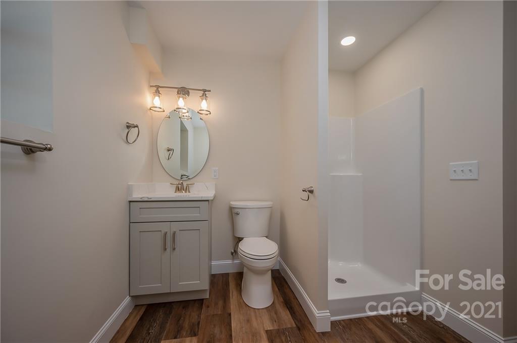 438 Gilbert Road Columbus, NC 28722 - Photo 30 of 46 a bathroom with a toilet and a sink