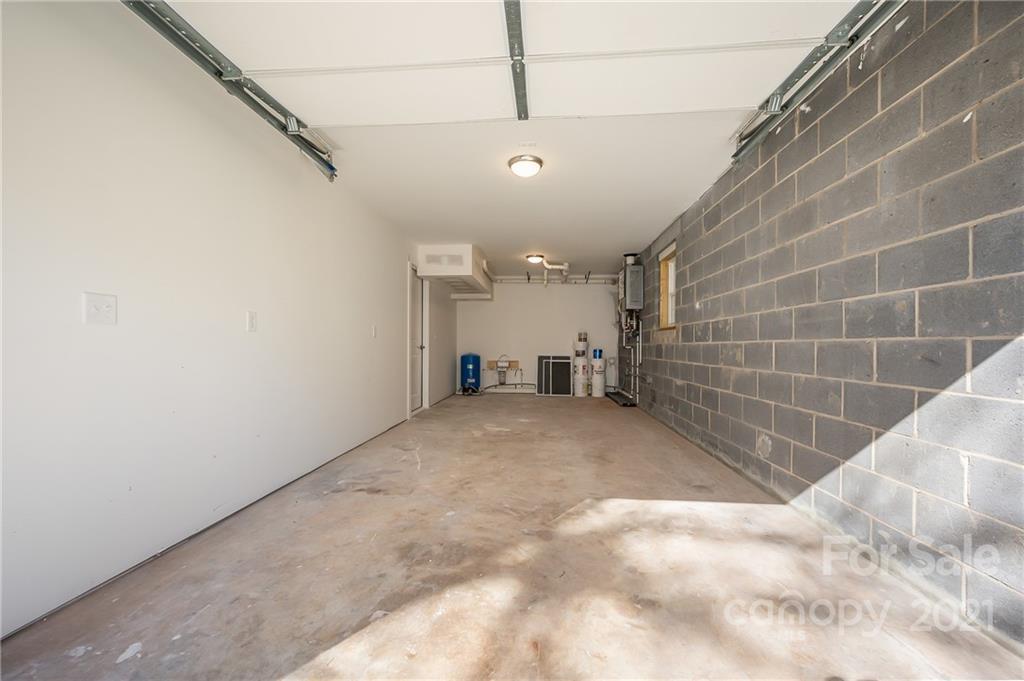 438 Gilbert Road Columbus, NC 28722 - Photo 36 of 46 a view of a hallway with a window