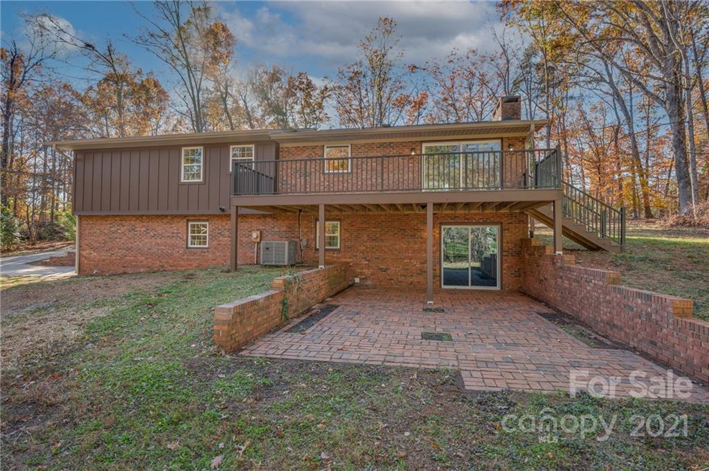 438 Gilbert Road Columbus, NC 28722 - Photo 41 of 46 a view of a house with a yard
