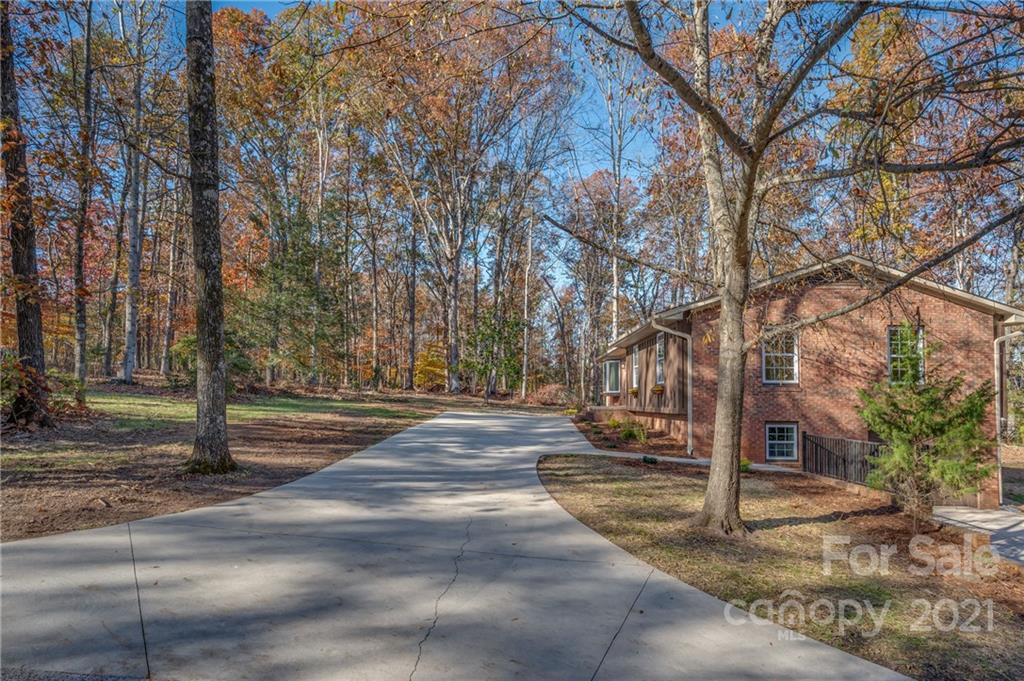 438 Gilbert Road Columbus, NC 28722 - Photo 43 of 46 a view of road with trees