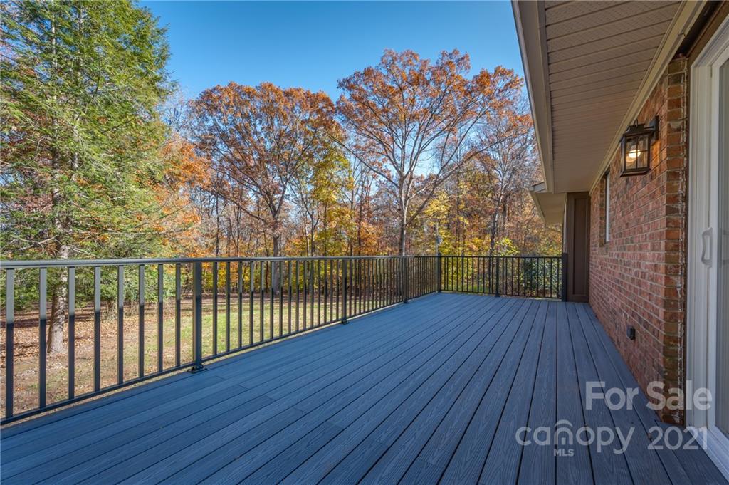 438 Gilbert Road Columbus, NC 28722 - Photo 9 of 46 a view of balcony with wooden floor