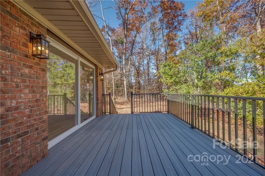 438 Gilbert Road Columbus, NC 28722 - Photo 10 of 46 a view of balcony with wooden floor