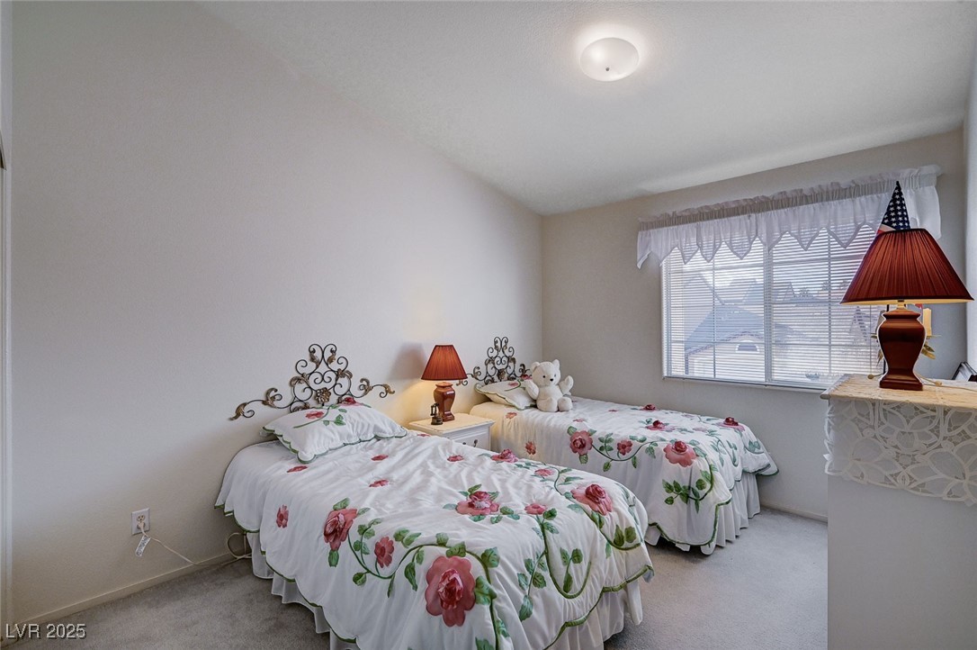 516 Crimson View Place Las Vegas, NV 89144 - Photo 43 of 66 Bedroom featuring carpet floors