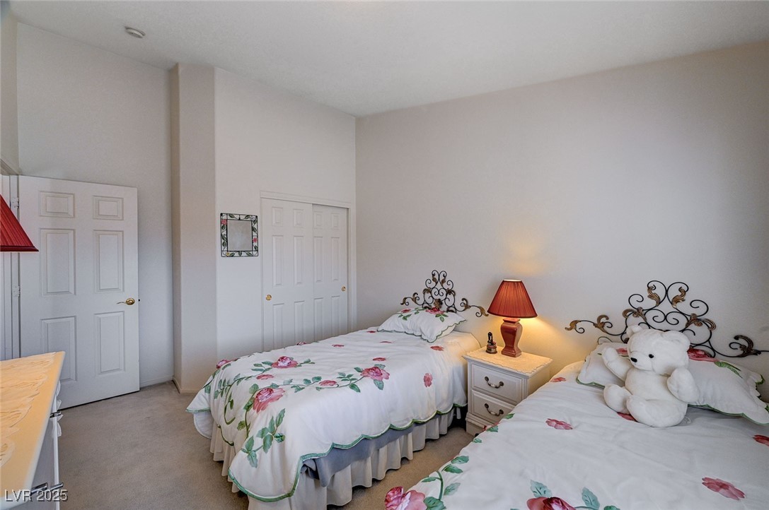 516 Crimson View Place Las Vegas, NV 89144 - Photo 44 of 66 Carpeted bedroom featuring a closet