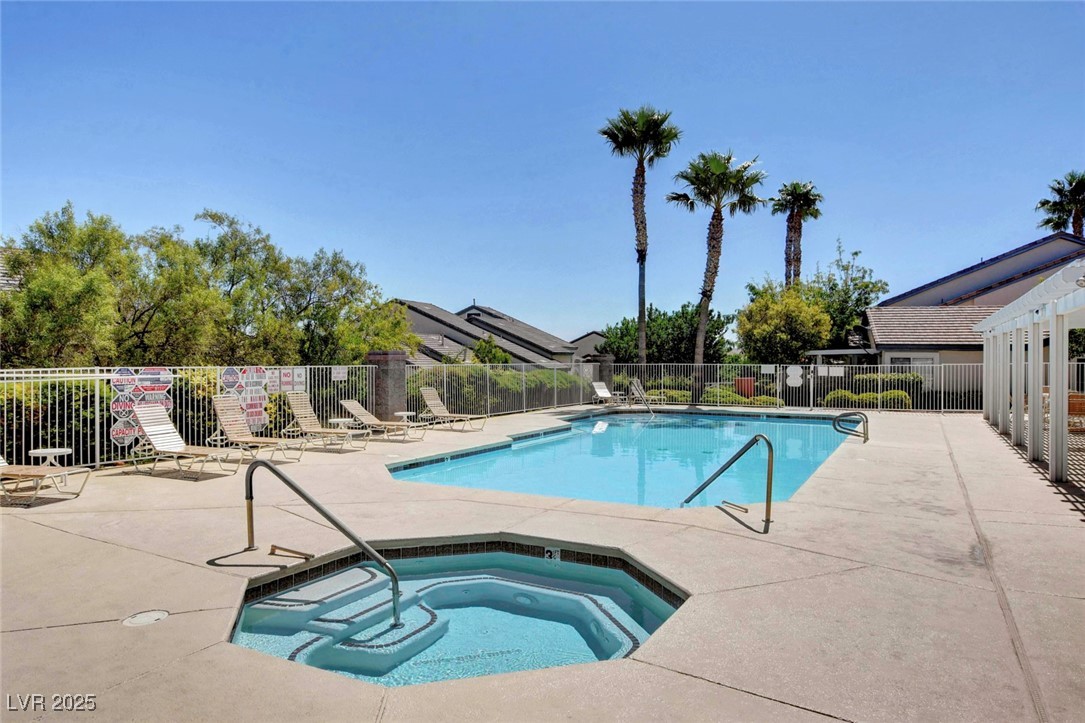 516 Crimson View Place Las Vegas, NV 89144 - Photo 57 of 66 Community pool featuring a community hot tub and a patio