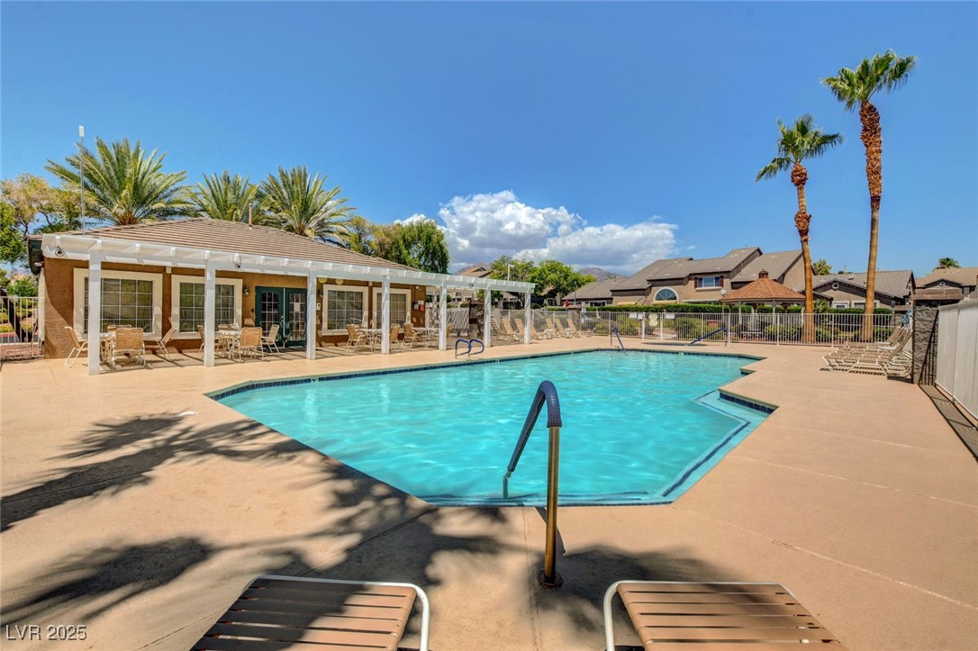 516 Crimson View Place Las Vegas, NV 89144 - Photo 63 of 66 Community pool featuring a patio