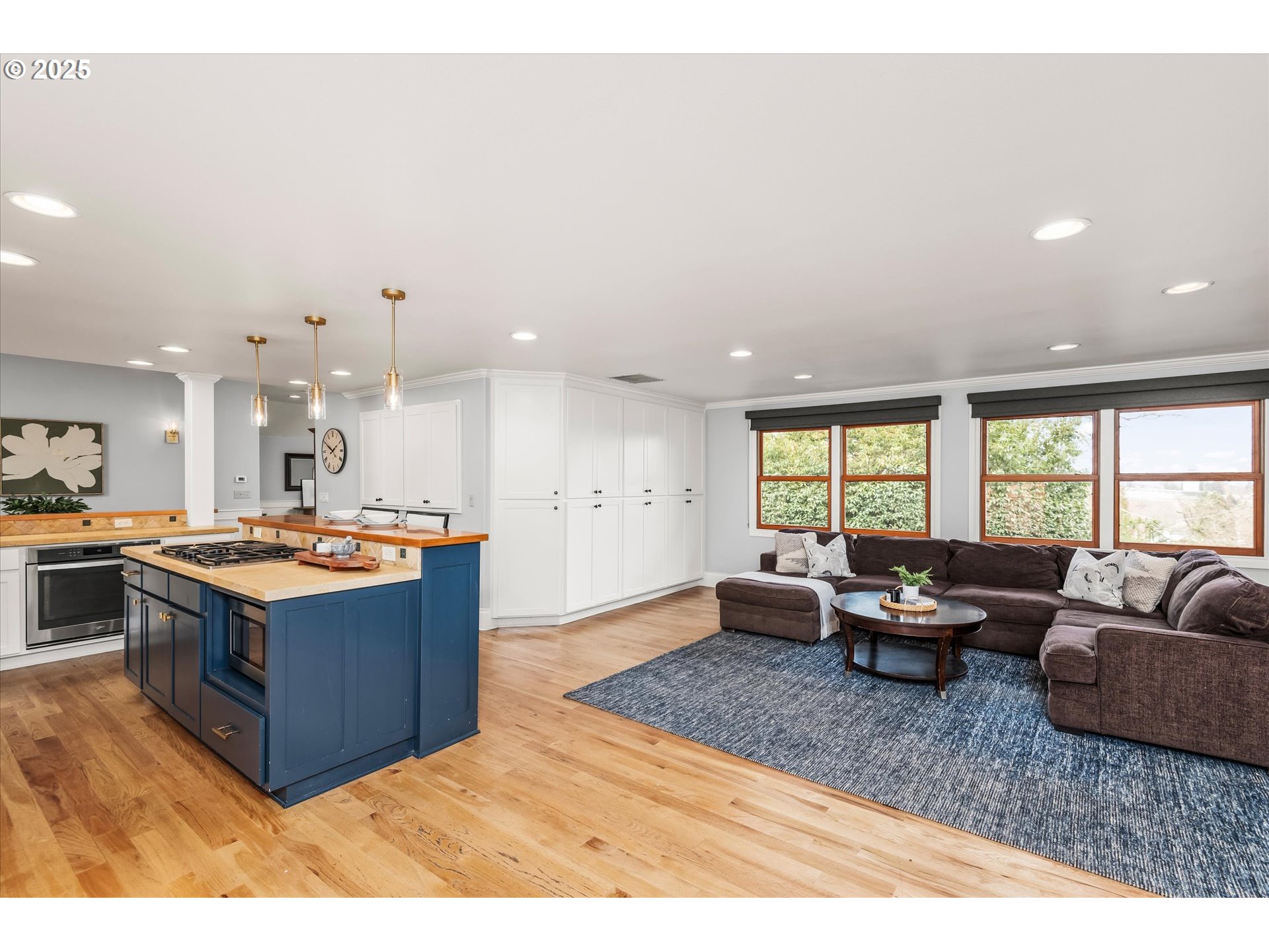 1705 Fairmount Boulevard Eugene, OR 97403 - Photo 18 of 48 a large living room with stainless steel appliances granite countertop a couch and a large window