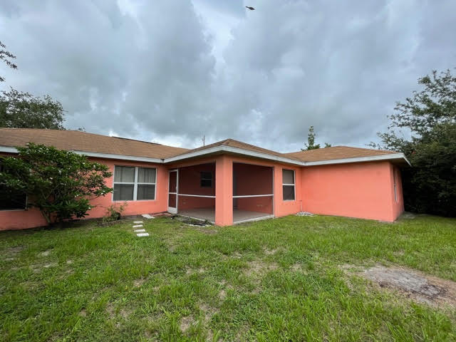 2675 Southwest Ann Arbor Road Port St. Lucie, FL 34953 - Photo 23 of 27 rear yard 2