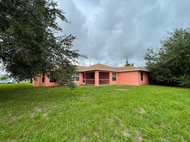 2675 Southwest Ann Arbor Road Port St. Lucie, FL 34953 - Photo 24 of 27 rear yard